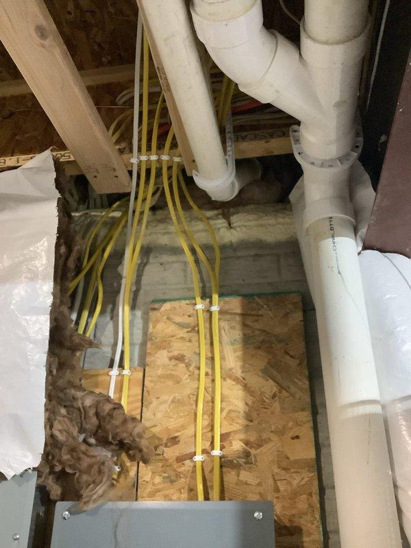 Completed routine maintenance flush on a 7-year-old 50-gallon electric tanked water heater (Model PRQX50, manufactured May 2018). Drained and flushed the tank to remove sediment buildup, inspected all safety labels and components for proper operation, and documented current system condition with photographs. Customer expressed interest in receiving a quote for tankless water heater replacement options.