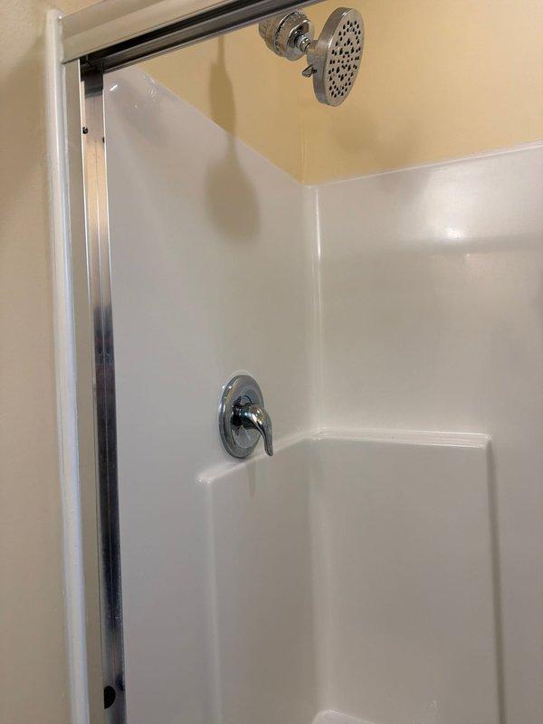 Responded to service call for clogged bathtub drain in 14-year-old residential property. Upon arrival, assessed the bathroom plumbing system and identified blockage in the bathtub drainage line. Successfully cleared the obstruction using appropriate drain cleaning equipment, restoring proper water flow and drainage function. Tested the system to verify complete resolution, and all fixtures were left in clean, operational condition.