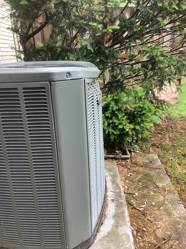 Responded to cooling complaint on approximately 10-12 year old Trane air conditioning unit. Upon arrival, confirmed condenser fan motor was not operating. Inspected outdoor unit and verified compressor was attempting to run but fan remained inoperative. Diagnosed failed condenser fan motor. Replaced defective fan motor with OEM equivalent replacement part. Tested system operation and verified proper airflow through condenser coil. Unit now cooling effectively with all components functioning as designed.