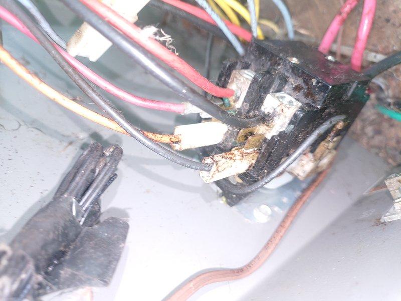 Responded to service call for non-operational central air conditioning system. Upon inspection, discovered severely corroded capacitor with rusted terminals and deteriorated wire connections, along with a separate electrical junction exhibiting extensive thermal damage, charring, and evidence of electrical arcing. Replaced failed capacitor and damaged wire connectors, cleaned all connection points, and secured all electrical terminations to manufacturer specifications. Tested system operation and verified proper amperage draw across all circuits. Unit restored to full operational status.