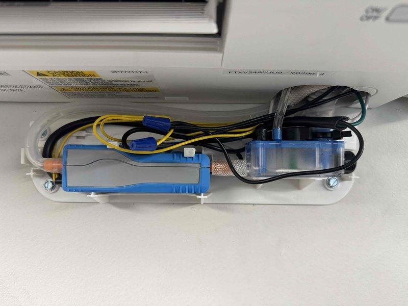 Responded to service call for recently installed mini-split system experiencing operational failure and interior water leakage. Installed condensate pump assembly with float switch and drainage line to address water management issues, secured all electrical connections and mounting hardware, and verified proper pump operation to resolve leaking condition.