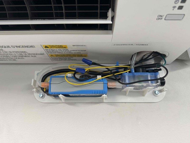 Responded to service call for recently installed mini-split system experiencing operational failure and interior water leakage. Installed condensate pump assembly with float switch and drainage line to address water management issues, secured all electrical connections and mounting hardware, and verified proper pump operation to resolve leaking condition.