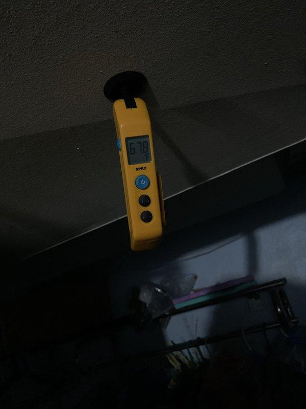 Completed preventive maintenance visit on residential air conditioning system. Measured system operating temperature at 57.8°F and inspected unit components. Replaced dirty air filter showing significant dust accumulation with new filter to restore proper airflow and system efficiency.