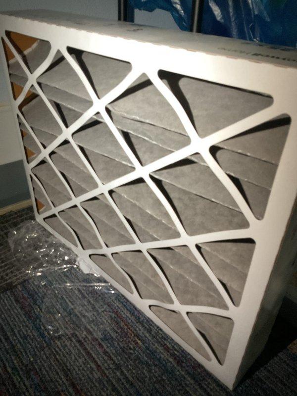 Completed preventive maintenance visit on residential air conditioning system. Measured system operating temperature at 57.8°F and inspected unit components. Replaced dirty air filter showing significant dust accumulation with new filter to restore proper airflow and system efficiency.