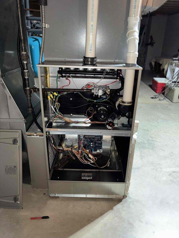# HVAC Maintenance - Cooling

Performed comprehensive annual air conditioning tune-up service on residential split system. Completed thorough inspection of outdoor condensing unit, verifying proper fan operation, checking refrigerant levels, and cleaning condenser coils. Examined indoor air handler and blower assembly, inspecting electrical connections, motor operation, and airflow components. All system components found operating within manufacturer specifications. System tested and confirmed cooling efficiently.