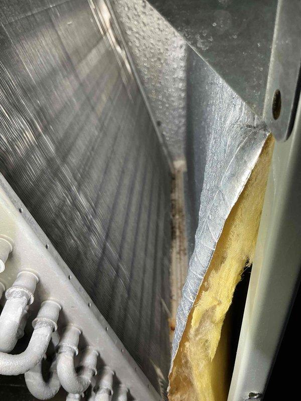 Completed routine MVP cooling maintenance on 10-year-old residential air conditioning system. Performed standard inspection of furnace and ductwork, verified proper operation of HVAC equipment, and documented system condition with photos showing basement installation with metal ductwork and insulation in satisfactory working order.