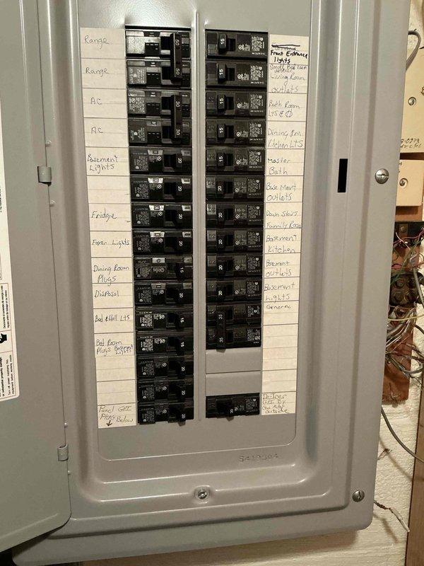 Performed site assessment for new mini split air conditioning system installation in second floor room with no existing equipment. Evaluated interior wall space and identified optimal mounting location for indoor air handler unit above window area. Inspected existing electrical panel to verify adequate circuit capacity and available breaker positions for dedicated mini split circuit connection. Documented installation requirements and captured measurements for equipment placement and line set routing.