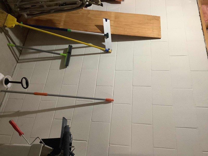 Provided comprehensive quote for water heater replacement at the property. Conducted thorough assessment of existing tanked water heater unit, surrounding plumbing connections, and installation area including overhead piping and structural clearances. Documented current system configuration with detailed photographs showing workspace preparation, existing plumbing infrastructure, ceiling-mounted supply and drain lines, and available access points for replacement unit installation.