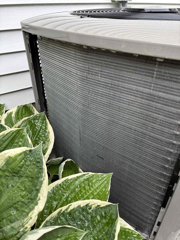 Completed comprehensive AC tune-up on 8-year-old residential cooling system and Payne furnace installation. Performed standard maintenance protocol including inspection of outdoor condenser unit, verification of proper airflow through protective mesh screening and fan assembly, and assessment of indoor air handler components. All equipment operating within normal parameters with no deficiencies noted.