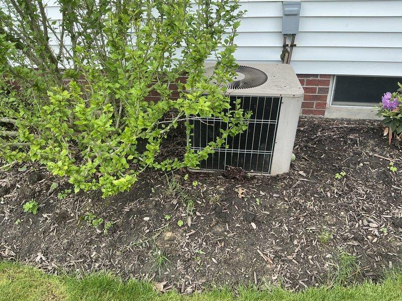 Responded to no cooling complaint and performed comprehensive assessment of existing HVAC system. Evaluated Armstrong Air furnace unit with Ultra V component in basement mechanical room, inspecting ductwork, electrical connections, and overall system configuration. Assessed outdoor condenser unit positioned in landscaped area adjacent to home foundation, examining unit condition, placement, and operational status. Provided detailed replacement estimate for complete HVAC system upgrade to restore cooling functionality and improve system efficiency.
