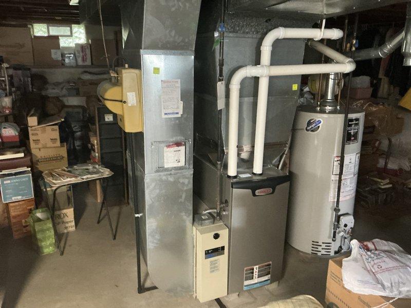 Serviced 22-year-old air conditioning system by adding refrigerant and leak seal to address cooling deficiency. Provided multiple replacement quotes for customer consideration, with decision pending follow-up meeting with household decision-makers.