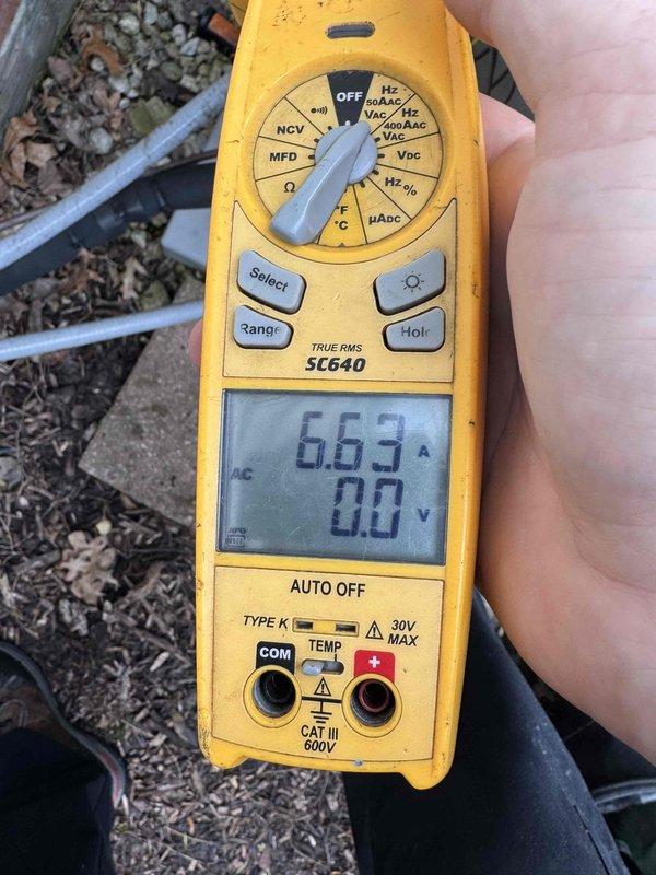 Completed comprehensive AC tune-up including system diagnostics and electrical verification. Measured compressor amperage at 6.63A using digital multimeter, confirming unit operating within manufacturer specifications. Inspected control panel wiring connections, verified all terminal blocks secure, and confirmed proper wire routing and grounding connections intact.
