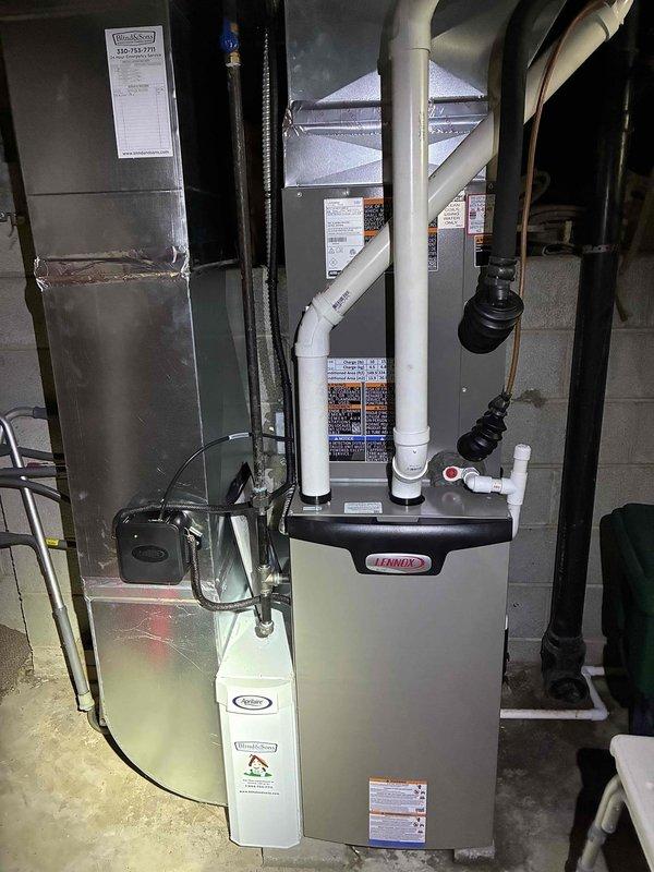 Completed annual cooling system maintenance on residential Lennox HVAC unit. Performed comprehensive inspection of blower wheel assembly, noting dust accumulation on blades and housing. Inspected furnace cabinet, venting system, condensate drainage components, and associated ductwork. All major components found operational. Customer advised that air filter requires replacement to maintain proper airflow and system efficiency.