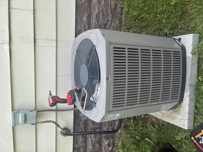 Completed comprehensive MVP cooling maintenance visit on 6-year-old residential HVAC system. Performed thorough inspection of outdoor condenser unit, verifying proper operation of fan assembly, checking electrical connections at disconnect box, and examining refrigerant line connections. Conducted indoor equipment assessment including furnace unit, ductwork insulation integrity, and air filtration components to ensure optimal system performance for the cooling season.