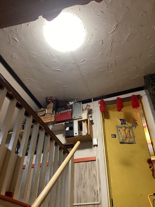 Installed new flush mount light fixture and switch at the top of interior stairwell using surface-mounted wire mold raceway to route new electrical wiring. Coordinated parts procurement, with all materials received and installation completed requiring three hours of labor. The new lighting system now provides proper illumination for the stairway area with convenient switch control at the upper landing.