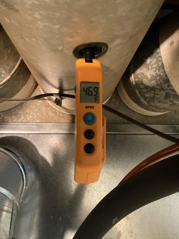 Completed scheduled preventive maintenance on 10-year-old residential air conditioning system. Performed comprehensive inspection including electrical components, refrigerant levels, and ductwork integrity. Inspected outdoor disconnect fuse assembly, noting weathered copper connections with oxidation present on fuse holders; fuses tested within acceptable parameters. Measured supply air temperature at 46.9°F, confirming proper cooling operation and adequate refrigerant charge. Examined ductwork insulation for integrity and proper sealing. System operating efficiently with no immediate repairs required. Recommended monitoring fuse assembly connections for future replacement consideration due to oxidation buildup.