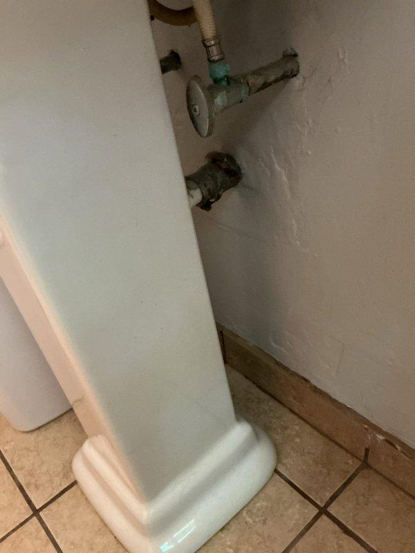 Responded to upstairs bathroom sink clog. Upon arrival, assessed the drainage system and identified blockage in the sink drain line. Utilized plunger and mechanical snaking equipment to clear the obstruction, restoring proper water flow and drainage function. Tested sink operation to confirm complete resolution, with water draining freely without backup. Photographed work area and plumbing connections for documentation purposes.