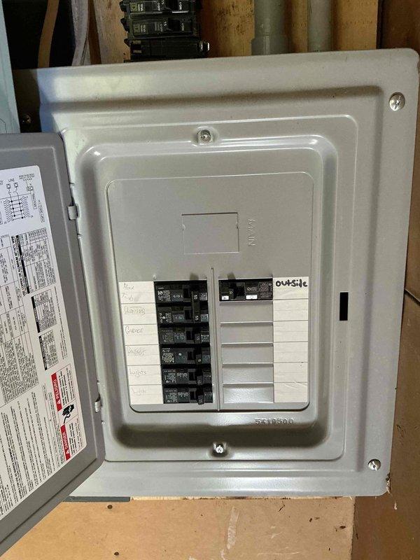 Conducted on-site assessment for residential generator installation at owner-occupied condominium constructed in 1973. Evaluated existing electrical service panel and infrastructure to determine requirements for standby generator system integration. Documented current electrical panel configuration, available breaker capacity, and service entrance specifications to develop comprehensive installation estimate for automatic transfer switch and generator connection.