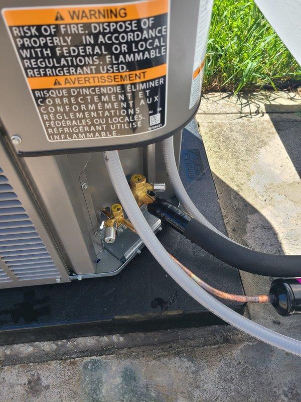 Completed AC installation with final equipment startup and system verification. Installed dual fuse assembly with proper electrical connections to outdoor condensing unit. Verified all refrigerant line connections at service ports, ensuring proper insulation on suction and liquid lines. Confirmed unit placement on concrete pad with adequate clearance for airflow and service access. All safety labels and warnings properly displayed on equipment. System tested and operational.

Addressed furnace noise complaint during visit. Inspected heating system and identified source of operational noise. Performed necessary adjustments to resolve issue. Both cooling and heating systems now functioning within normal operating parameters.