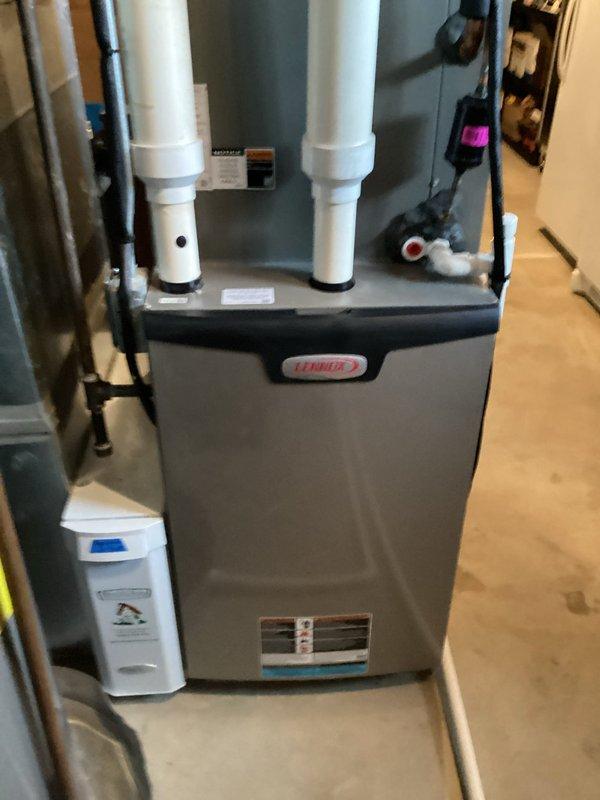 Completed scheduled MVP cooling maintenance visit on Lennox HVAC system. Performed comprehensive inspection of furnace unit, verified proper operation of electrical components and connections, checked venting system integrity with white PVC intake and exhaust pipes, and conducted temperature differential measurements using calibrated digital instrumentation to ensure optimal system performance and efficiency.
