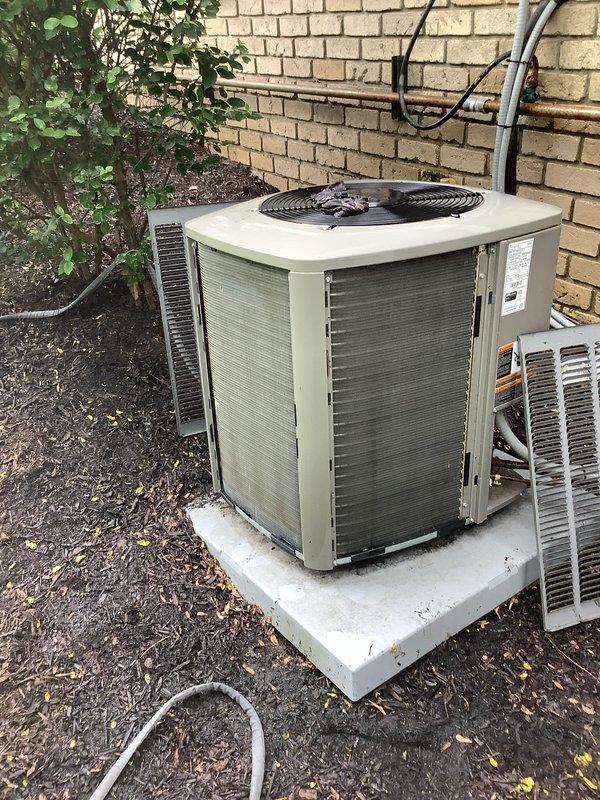# HVAC Maintenance - Cooling

Completed scheduled MVP cooling maintenance visit on residential air conditioning system. Performed comprehensive inspection of outdoor condenser unit, verified proper operation of compressor and condenser fan motor, checked refrigerant lines and electrical connections along exterior wall mounting. Unit found in operational condition with adequate airflow through metal louvers and fan assembly functioning normally on concrete pad installation.