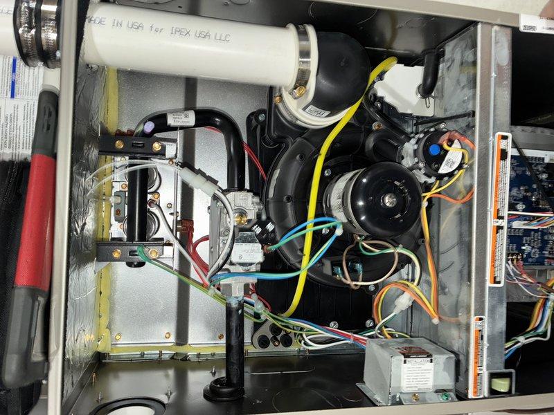 Completed preventive maintenance inspection on 2-year-old Carrier outdoor condensing unit. Performed standard cooling system evaluation including visual inspection of condenser coils, electrical connections, and blower motor assembly. Verified proper operation of all internal components, checked wiring connections and control boards, and confirmed unit is functioning within normal parameters for continued reliable operation.
