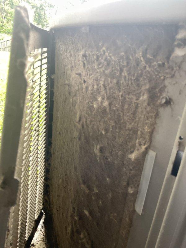 Responded to a no-cooling complaint on a central air conditioning system. Upon inspection, found the outdoor condenser unit's coil heavily contaminated with dirt, dust, and debris buildup, severely restricting airflow and reducing heat transfer efficiency. Cleaned the condenser coil thoroughly, removing accumulated grime from fins and internal surfaces. Verified proper airflow restoration and system operation upon completion.