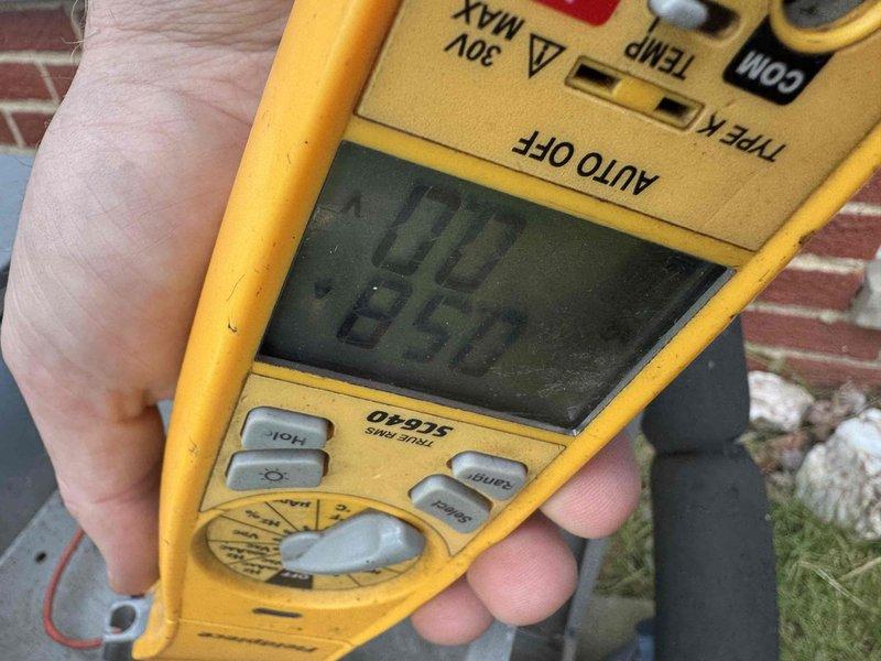 Responded to no-cooling call for central air conditioning unit that failed to operate during first use of the season. Upon arrival, removed top panel and performed diagnostic testing of outdoor condensing unit components. Used digital multimeter to test electrical connections, capacitor, and compressor functionality. Identified failed component preventing unit operation, completed necessary repairs to restore system functionality, and verified proper operation of compressor, condenser fan, and electrical controls before closing unit and returning system to service.