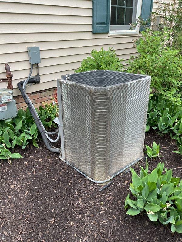Completed scheduled maintenance visit on 2-year-old residential air conditioning system. Performed comprehensive inspection of indoor and outdoor components, including temperature diagnostics at ductwork using digital thermometer. Verified proper operation of condenser unit, checked refrigerant lines, electrical connections at disconnect box, and confirmed adequate airflow through coil fins. System operating within normal parameters with no deficiencies noted. Unit maintained proper clearance from surrounding landscaping for optimal performance.