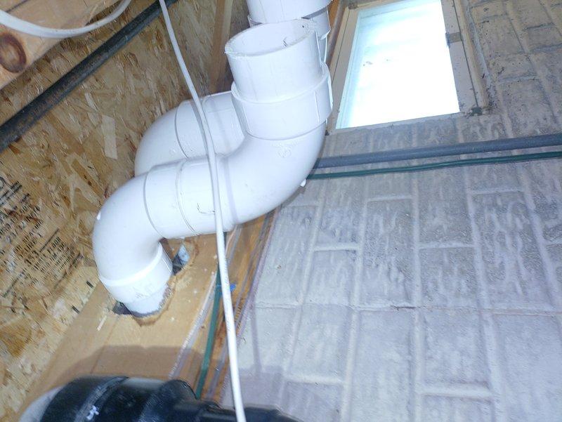 Responded to service call for furnace displaying blinking red error light. Upon inspection, discovered furnace condensate drain line severely obstructed with debris and nesting material at exterior termination point. Cleared blockage from PVC condensate drain assembly, including exterior vent opening and interior piping connections in attic space. Verified proper drainage flow, tested furnace operation, and confirmed error code cleared. System restored to normal operation with proper condensate removal functioning.