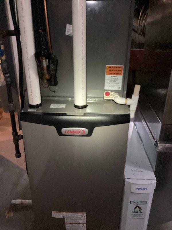Completed preventive maintenance cooling visit on 5-year-old Lennox HVAC system under MVP recurring service plan. Performed standard air conditioning maintenance procedures including system inspection, temperature diagnostics showing 87.4°F reading at supply duct, and verification of proper operation of furnace unit and associated components including Aprilaire air quality equipment. All systems operating within normal parameters with no issues identified.