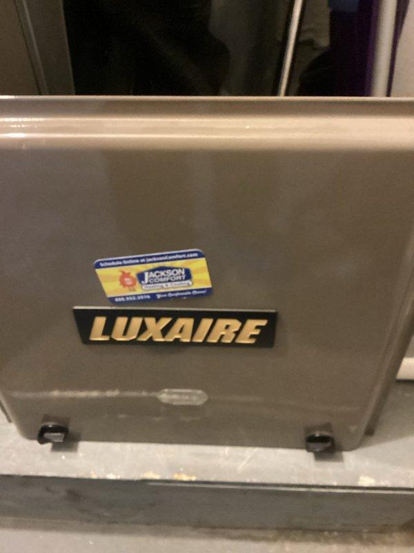 Completed routine maintenance on an 8-year-old Luxaire air conditioning system. Performed standard cooling season inspection including system diagnostics, temperature measurements, and visual assessment of the air handler unit and insulation components to ensure optimal performance and efficiency.