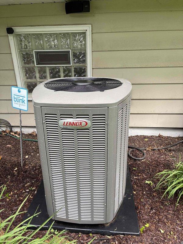 Completed annual maintenance on 1-year-old Lennox air conditioning system. Performed comprehensive inspection of outdoor condensing unit, verified proper operation of compressor and condenser fan motor, checked electrical connections and capacitors for proper function, and confirmed adequate refrigerant charge. All components operating within normal parameters with no issues identified during this preventive maintenance visit.