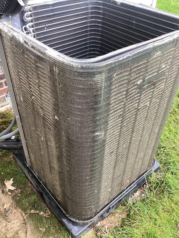 Completed scheduled preventive maintenance on 9-year-old residential cooling system. Performed comprehensive inspection of outdoor condensing unit, including examination of condenser coils, fan operation, and cabinet condition. Unit showed significant accumulation of dust and debris on exterior grille surfaces, which was documented. Verified proper refrigerant line connections and assessed overall system functionality. All components operating within normal parameters at time of service.