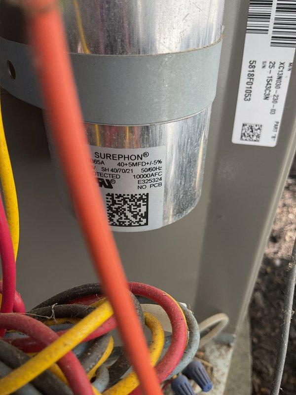 Completed comprehensive spring tune-up on eight-year-old air conditioning system, including full inspection of electrical components, capacitor testing (40+5 MFD dual run capacitor verified within tolerance), and verification of all wire connections at contactor and terminal blocks. Unit was found in good operating condition with all electrical components functioning properly and system ready for cooling season.