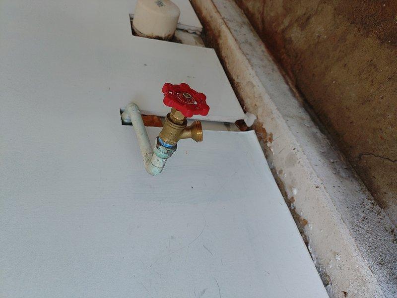Replaced rear exterior hose bib with new frost-free Woodford sillcock, including installation of new shut-off valve with red wheel handle to control water supply. Additionally replaced garage hose bib with new female threaded hose bib. All connections were properly secured using brass fittings and copper pipe connections to ensure reliable, freeze-resistant outdoor water access at both locations.
