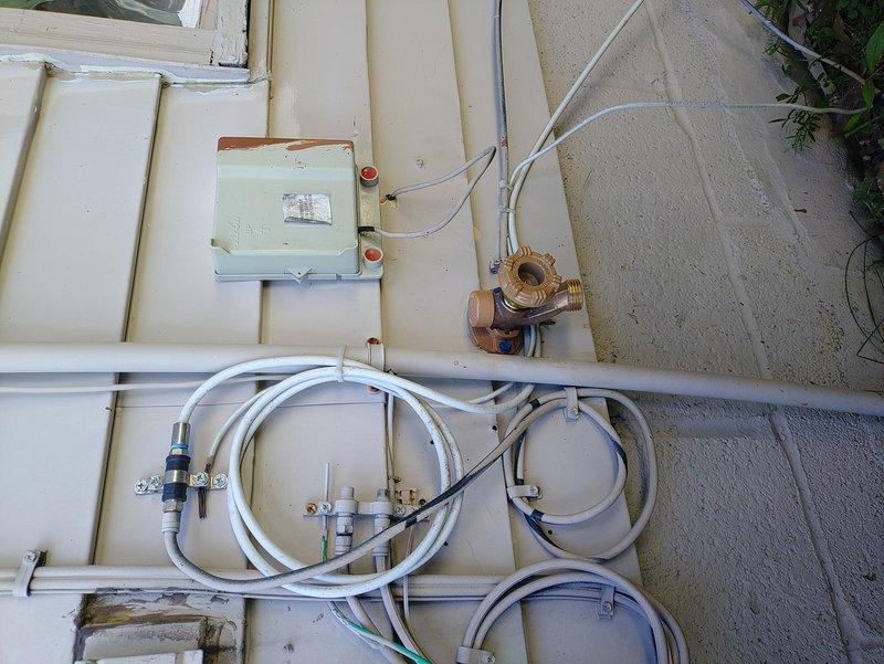 Replaced rear exterior hose bib with new frost-free Woodford sillcock, including installation of new shut-off valve with red wheel handle to control water supply. Additionally replaced garage hose bib with new female threaded hose bib. All connections were properly secured using brass fittings and copper pipe connections to ensure reliable, freeze-resistant outdoor water access at both locations.