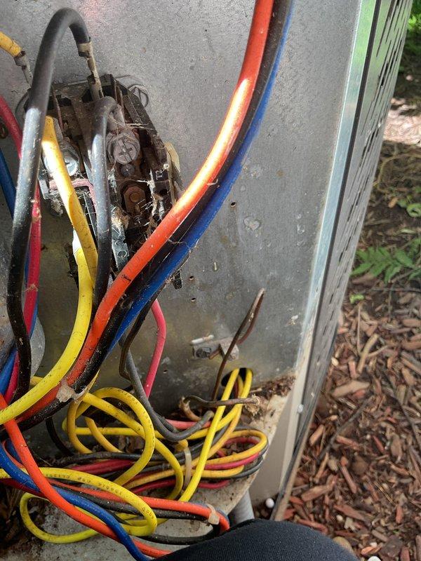 Responded to no cooling complaint on residential air conditioning system aged 15-20 years. Upon arrival, performed diagnostic evaluation of outdoor condensing unit. Connected manifold gauge set to service ports to measure system pressures and assess refrigerant charge. Conducted visual inspection of condenser unit exterior, electrical connections, and refrigerant line set. Unit showed signs of age-related wear with weathering on exterior panels and some corrosion present at service connection points. System evaluation completed to determine operational status and identify potential causes of inadequate cooling performance.