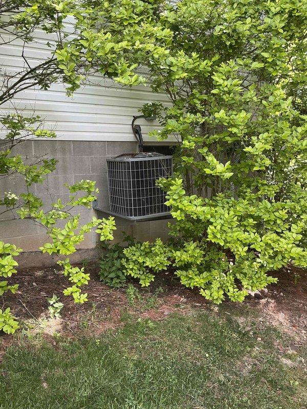 Completed on-site assessment for furnace and air conditioning system replacement in residential basement mechanical room. Evaluated existing gray metal furnace/air handler unit with associated ductwork and outdoor condensing unit positioned on concrete pad against home exterior. Provided comprehensive replacement estimate covering both heating and cooling equipment, including evaluation of electrical connections, ductwork configuration, and outdoor unit placement with consideration for proper clearances and accessibility for future maintenance.
