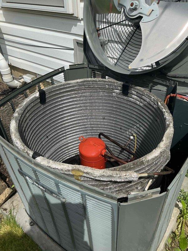 Completed MVP cooling maintenance visit on 11-year-old residential HVAC system. Performed thorough inspection of outdoor condensing unit, removing top panel to access internal components and assess condition of evaporator coils, which showed significant accumulation of dust, dirt, and mineral deposits requiring attention. Inspected indoor furnace unit and associated components including gas valves, electrical connections, copper refrigerant lines, and PVC condensate drainage system to ensure proper operation and system integrity for continued reliable cooling performance.