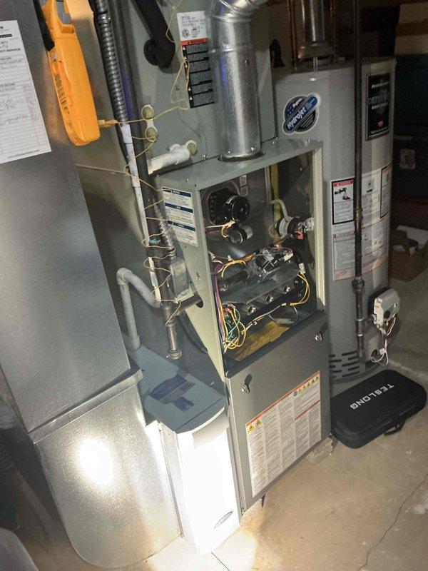 Completed MVP cooling maintenance visit on 11-year-old residential HVAC system. Performed thorough inspection of outdoor condensing unit, removing top panel to access internal components and assess condition of evaporator coils, which showed significant accumulation of dust, dirt, and mineral deposits requiring attention. Inspected indoor furnace unit and associated components including gas valves, electrical connections, copper refrigerant lines, and PVC condensate drainage system to ensure proper operation and system integrity for continued reliable cooling performance.