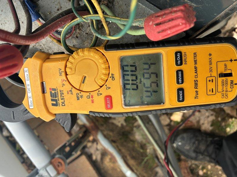 Completed MVP cooling maintenance visit on 11-year-old system. Performed electrical diagnostics using clamp meter to verify amperage draws and voltage readings across all circuit connections. All measured values fell within manufacturer specifications, confirming proper electrical operation and system performance.