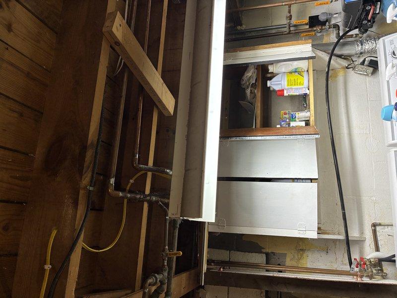 Responded to no power call for fluorescent light fixture previously installed in March. Upon inspection, traced issue to junction box in unfinished area with exposed framing near HVAC equipment. Verified circuit breaker position, tested voltage at junction box, and confirmed proper wire connections. Identified failed ballast in fluorescent fixture as root cause of complete power loss. Replaced defective ballast, restored power to fixture, and verified proper operation before completing service call.