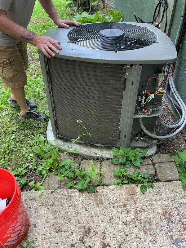 Completed MVP cooling maintenance visit on residential air conditioning system. Performed comprehensive inspection of outdoor condensing unit, including examination of internal components with front panel access, verification of electrical connections and refrigerant lines, and assessment of coil condition. Unit operational and system functioning properly at time of service.
