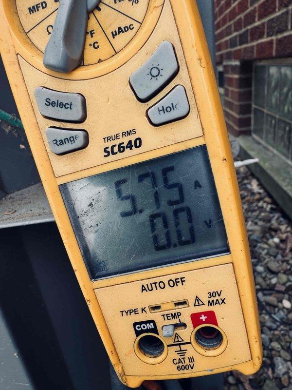 Completed scheduled MVP cooling maintenance on 9-year-old air conditioning system. Performed comprehensive system inspection including blower wheel and motor assembly evaluation. Measured and verified electrical parameters using digital multimeter, recording capacitor reading of 535 MFD to ensure proper motor operation. Inspected blower assembly for dust accumulation and overall operational condition within air handler cabinet.