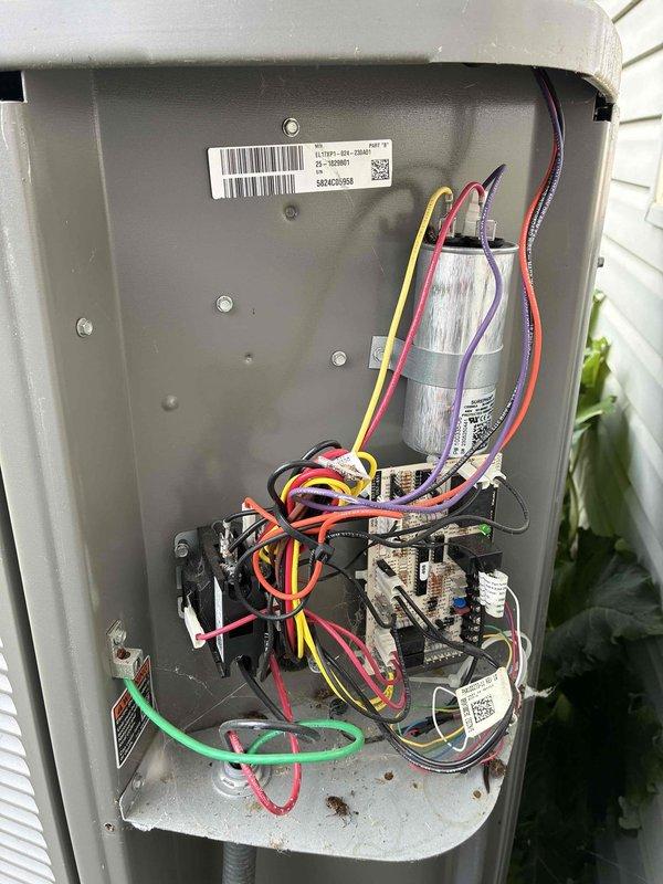 # HVAC Maintenance - Cooling

Performed annual preventive maintenance on a two-year-old residential air conditioning system. Upon arrival, conducted comprehensive inspection revealing severely soiled condenser coil with heavy accumulation of dirt, dust, debris, and white residue streaking that had significantly compromised heat transfer efficiency. Thoroughly cleaned condenser coil fins to restore proper airflow and heat exchange capability, removing caked-on environmental contaminants and organic matter. Inspected electrical control panel components including capacitor, contactors, and relay connections, verifying all wiring terminations were secure and electrical components were functioning within normal parameters. System restored to optimal operating condition and ready for cooling season demand.