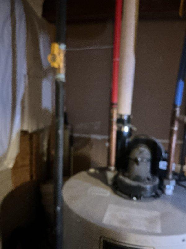 Replaced existing tanked water heater with new unit per customer request for expedited installation. Completed full water heater replacement including reconnection of all copper supply and return lines, circulator pump reinstallation, and proper connection of expansion tank. All plumbing connections were secured with appropriate fittings, insulation was applied to hot and cold water lines, and system was tested for proper operation and leak-free performance.