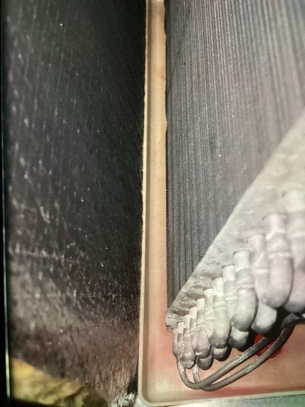 Completed scheduled MVP cooling maintenance visit. Inspected evaporator coils and found moderate dust accumulation on fins and surrounding ductwork components. Verified electrical connections at control panel, confirmed all wire terminations secure and properly bundled. All system components operational and functioning within normal parameters.
