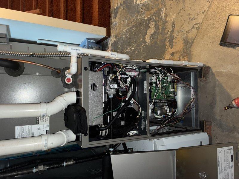 Completed routine maintenance inspection on two-year-old residential air conditioning system. Accessed indoor air handler unit, inspected all internal components including blower motor assembly, electrical connections, circuit boards, and condensate drainage system. Noted heavily soiled air filter with significant dust and debris accumulation throughout filter media. Examined all wiring harnesses, verified secure connections at control boards and motor terminals. Confirmed proper operation of blower assembly and verified condensate drain lines are clear and functioning correctly. All mechanical and electrical components operating within normal parameters. Unit performing as expected for age and usage.