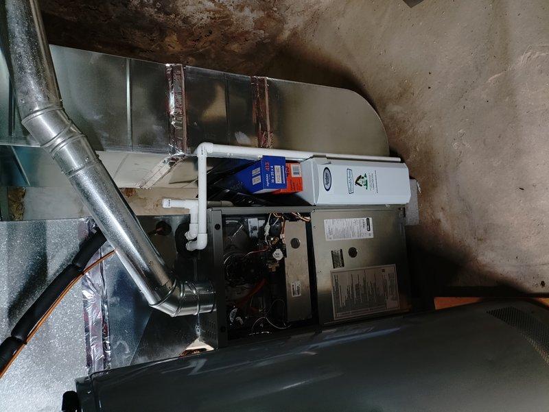 # HVAC Maintenance - Cooling Service

Completed MVP cooling maintenance visit on two residential HVAC systems. Upon inspection, discovered significant frost and ice accumulation on evaporator coil of one unit, indicating airflow restriction or potential refrigerant issue. Documented equipment conditions including furnace/air handler installation, ductwork connections, and condensate drainage system. System requires follow-up diagnostic service to address frozen coil condition and restore proper cooling operation.